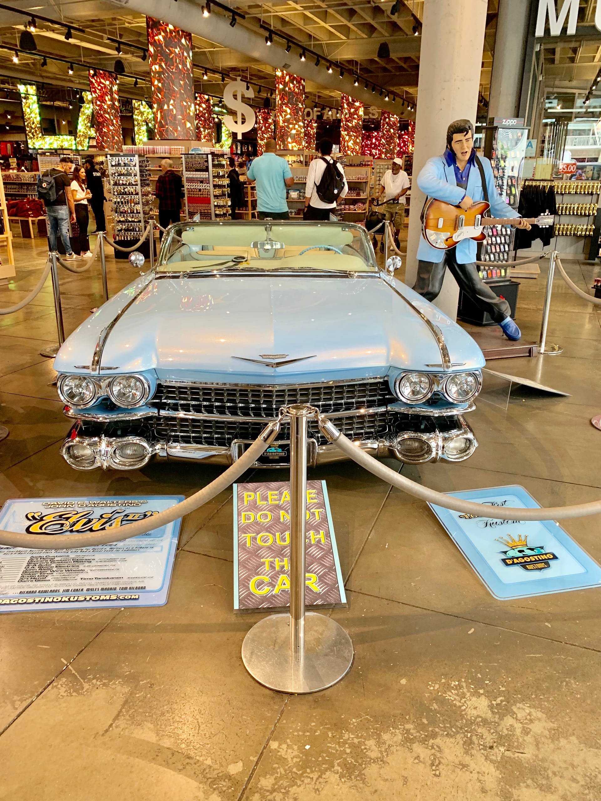 Classic convertible and Elvis display at a Hollywood exhibit